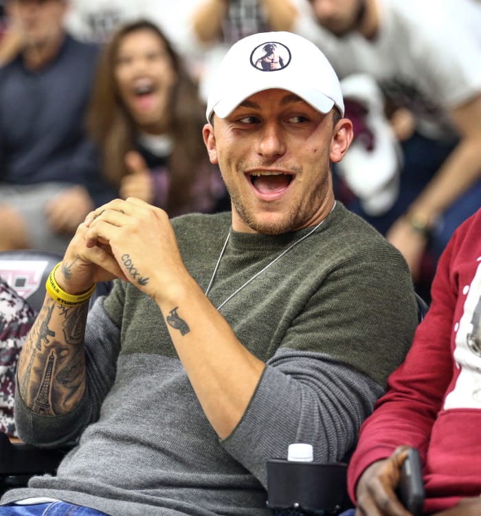 Former Browns quarterback Johnny Manziel watches a men's basketball game between his alma mater, Texas A&M, and the University of Kentucky in 2017. Off-the-field issues were one of Manziel's primary downfalls in his time with the Browns.